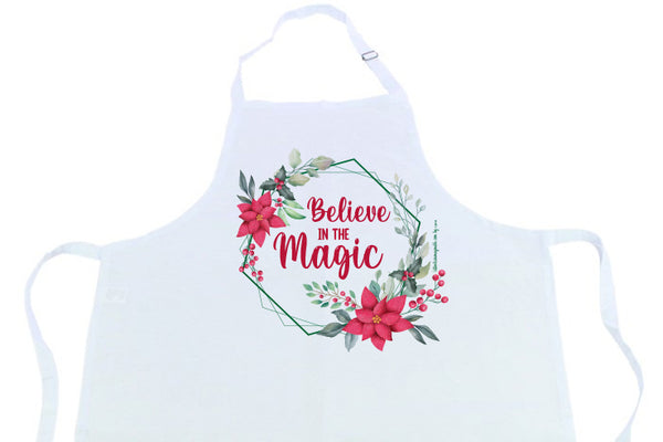 Delantal blanco con hebilla y diseño navideño "Belive in the Magic"